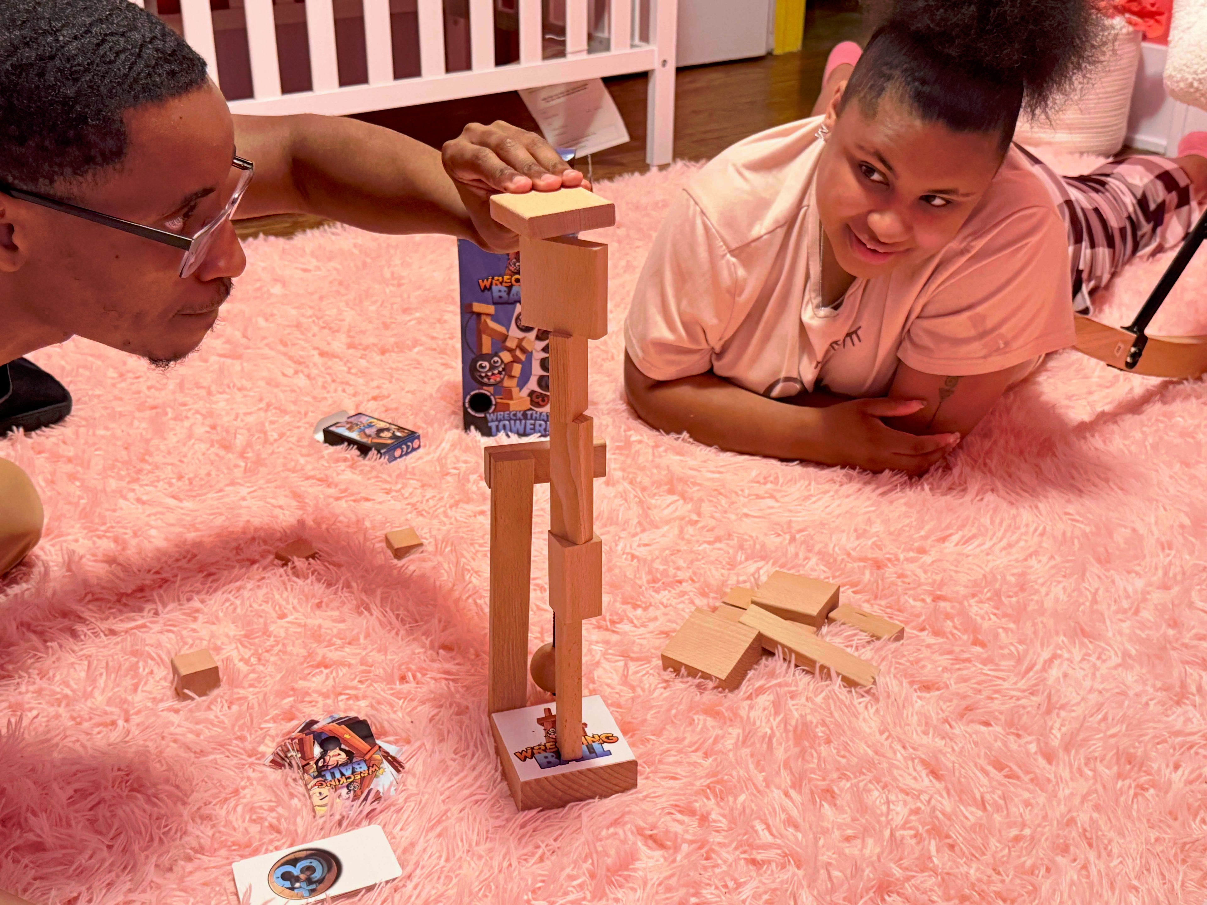 Wrecking Ball — The Block-Stacking Game with a Real Wrecking Ball